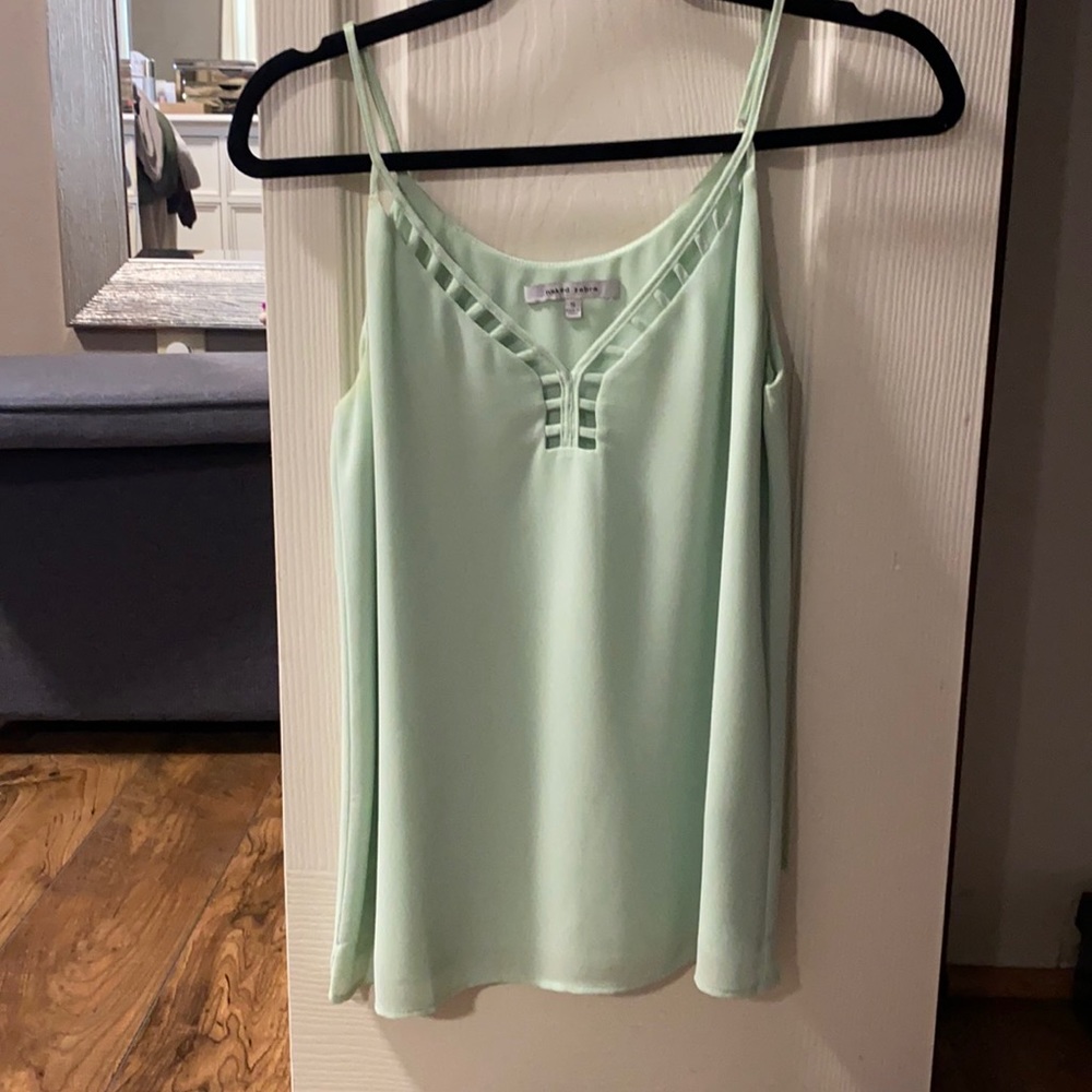 Light minty tank with square cut outs